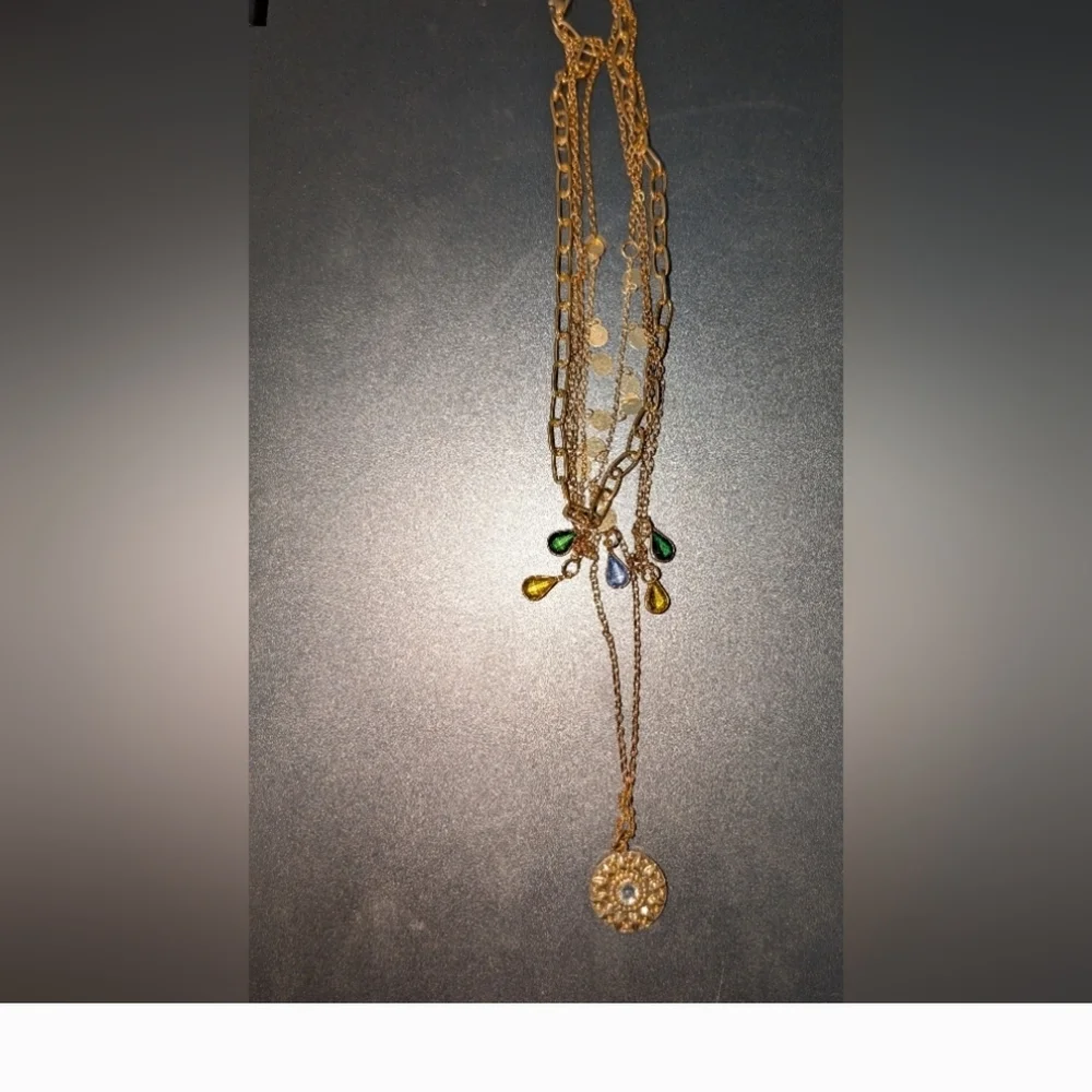 Elegant Triple-Strand Necklace in Coppery Metal with Crystal Teardrops